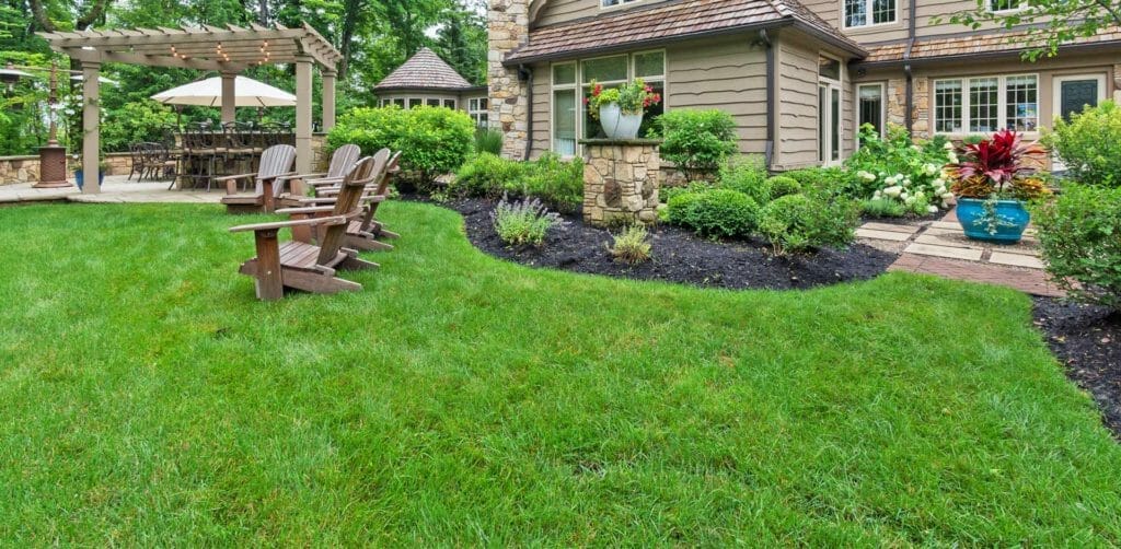 green lawn with outdoor seating