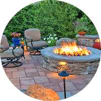 beautiful landscaped patio with firepit